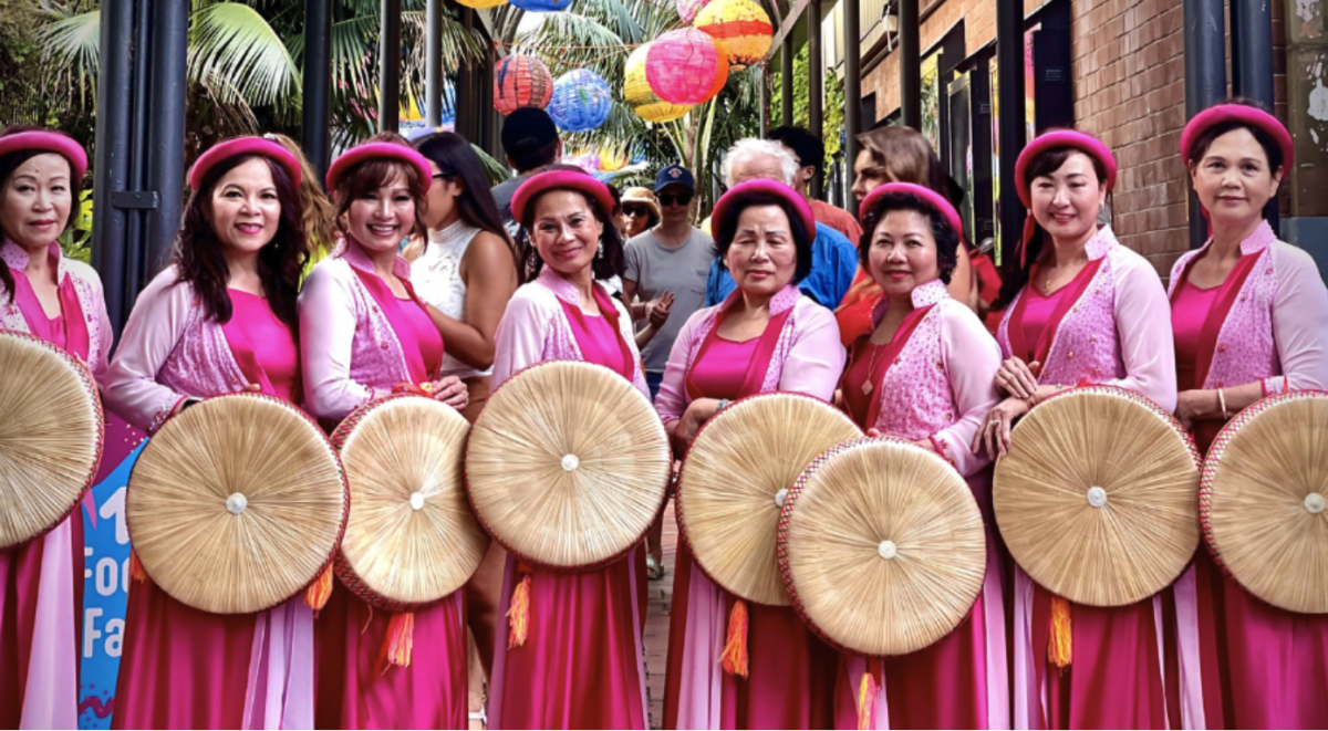 Women wearing colourful traditional Vietnamese garb